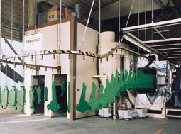 Le four enduisant de poudre 